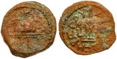 Ancient Coins Judea. Herodian Dynasty. Herod I The Great. AE 8 prutot (5.53g), 40-4 BCE. Year 3. Struck 40 BCE. Military helmet, frontal view. Reverse: of King Herod tripod, bowl above and flanked by 