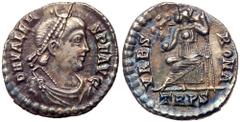 Ancient Coins Valens. Silver Siliqua (2.16 g), AD 364-378. Treveri, AD 367-375. D N VALENS P F AVG, diademed, draped and cuirassed bust of Valens right. Reverse: VRBS ROMA, Roma seated left on throne,