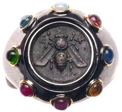 Ancient Coins Lovely, Modern Set Ancient Greek Silver Coin ca. 387-298 B.C in Sterling Silver and Semi-Precious Stones. Lady's sterling Silver ring with 8 multi-color cabochons which include: opal, to