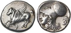 Collection Marc Bar - The Marc Bar Collection CORINTHE, AR statère, 386-307 av. J.-C. D/ Pégase en vol à g. Dessous, . R/ T. casquée d'Athéna à g. A la pointe du cou, A-Λ. Derrière la nuque, masque d