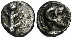 CYRENAIQUE, CYRENE, AR drachme, 480-435 av. J.-C. Droit : Plant de silphium. Revers : Tête de Zeus-Amon à droite, avec des cornes de bélier, entourée d'un cercle de grènetis, dans un carré incus. Ref.