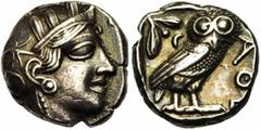ATTIQUE, ATHENES, AR tétradrachme, vers 400 av. J.-C. Droit : Tête casquée d'Athéna à droite, le casque orné d'un fleuron et de feuilles d'olivier. Revers : ΑΘΕ Chouette à droite, tête de face. A gauc