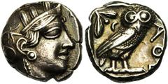 ATTIQUE, ATHENES, AR tétradrachme, vers 400 av. J.-C. Droit : Tête casquée d'Athéna à droite, le casque orné d'un fleuron et de feuilles d'olivier. Revers : ΑΘΕ Chouette à droite, tête de face. A gauc