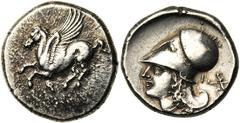 CORINTHE, AR statère, 386-307 av. J.-C. Droit : Pégase en vol à gauche. Dessous, [..]. Revers : Tête casquée d'Athéna à gauche, entourée de Δ-I. A droite, Artémis tenant une longue torche, courant à g