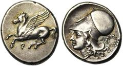Greek Coins CORINTHE, AR statère, 386-307 av. J.-C. Droit : Pégase en vol à gauche. Dessous, [..]. Revers : Tête casquée d'Athéna à gauche. Derrière, Δ et couronne de lierre. Ref.: Ravel, 1003. 8,56g.