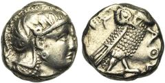 Greek world ATTIQUE, ATHENES, AR tétradrachme, 3e s. av. J.-C. Imitation arabe. D/ T. casquée d'Athéna à d., le casque orné d'un fleuron et de feuilles de laurier. R/ Chouette à d., t. de f. A g., pou