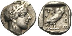 GREEK WORLD ATTIQUE, ATHENES, AR tétradrachme, vers 410 av. J.-C. D/ T. casquée d''Athéna à d., le casque orné d''un fleuron et de trois feuilles d''olivier. R/ Chouette à d., t. de f. A g., pousse d'