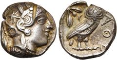 GREEK WORLD ATTIQUE, ATHENES, AR tétradrachme, vers 400 av. J.-C. D/ T. casquée d''Athéna à d., le casque orné d''un fleuron et de feuilles d''olivier. R/ ΑΘΕ Chouette à d., t. de f. A g., pousse d''o
