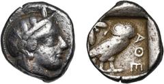 GREEK WORLD ATTIQUE, ATHENES, AR tétradrachme, 400-350 av. J.-C. D/ T. casquée d''Athéna à d., le casque orné d''un fleuron et de feuilles d''olivier. R/ AΘE Chouette à d., t. de f. A g., rameau d''ol