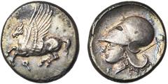 GREEK WORLD CORINTHE, AR statère, 386-307 av. J.-C. D/ Pégase en vol à g., les deux ailes visibles. Dessous, . R/ T. casquée d''Athéna à g. Sous le menton, Γ. Derrière la t., thyrse orné de bandelett