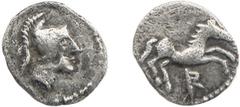 Colección Cores DIVISORES IBÉRICOS INCIERTOS. Tetartemorion. A/ Cabeza con casco y cimera a der. R/ Caballo saltando a der., debajo letra R. AR 0,21 g. ACIP-536. CC-1053, mismo ejemplar. MBC. Rarísima