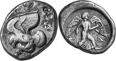 THE COINAGE OF OLYMPIA c. 468-452, Olympiads 78-82 Estimate: CHF 1'800.00 Stater (Silver, 11.78 g 11), c. 460s-450s. Eagle flying left as last, from the same die, but with at least four countermarks, 