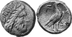 THE COINAGE OF OLYMPIA The Bronze Coinage of Olympia Estimate: CHF 200.00 Unit (AE 18 mm, 5.82 g 9), 3rd century. Laureate head of Zeus to right. Rev. F Eagle standing right with closed wings; to righ