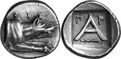 Argos The coinage of Argos from the mid-4th century unti Estimate: CHF 250.00 Triobol (Silver, 2.76 g 7), c. 320s-270s. Forepart of wolf at bay to right; above, . Rev. with - above and club right belo