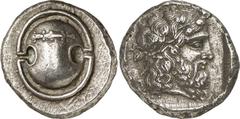 Thessaly-Euboea Thessaly-Euboea, Thebes, Boeotia Estimate: CHF 20'000.00 Stater (Silver, 12.32 g), 425-395. Boeotian shield with club to left across the upper half. Rev. Bearded head of Dionysos to ri