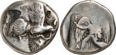 Attica-Islands of the Aegean Attica-Islands of the Aegean, Olympia, Elis Estimate: CHF 2'200.00 Stater (Silver, 11.61 g 2), c. 440s-430s, signed by Euth… on the reverse. Eagle flying right with both w