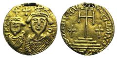 Arab-Sasanian, c. 7th century, Anonymous AV "Solidus" (19mm, 1.71g, 12h). Imitating a Constantinople issue of Heraclius. Crowned and draped facing busts of Heraclius and Constantine, opposite their us