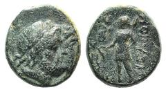 Lydia, Nysa, c. 1st century BC. Æ (15mm, 4.48g, 12h). Jugate heads of Hades and Demeter r. R/ Dionysos standing l., holding kantharos and thyrsus. Regling Nysa 15a. Very Rare. Green patina, VF
