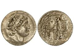 Tetradracma. 138-129 a.C. ANTÍOCO VII. REINO SELÉUCIDA. Anv.: Cabeza diademada a derecha. Rev.: Atenea en pie a izquierda, sosteniendo a Nike, delante y detrás leyenda. 16,60 grs. AR. Se-7092. EBC-.