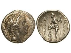 Tetradracma. 294-288 a.C. DEMETRIO POLIORKETES. MACEDONIA. Anv.: Cabeza diademada de Demetrio a derecha. Rev.: Poseidón en pie a izquierda, delante y detrás leyenda. 16,80 grs. AR. (Oxidaciones). Se-6