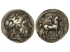 Tetradracma. 359-336 a.C. FILIPO II. MACEDONIA. Anv.: Cabeza laureada de Zeus a derecha. Rev.: Jinete desnudo a derecha, encima y al lado leyenda, debajo símbolo. 14,10 grs. AR. (Muesca en canto). Se-