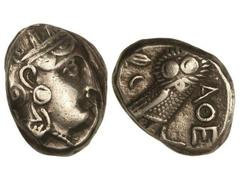 Tetradracma. 300-262 a.C. ATENAS. Anv.: Cabeza de Atenea a derecha. Rev.: Lechuza a derecha, delante A¶E, detrás rama de olivo y creciente. 16,90 grs. AR. Se-2547. MBC.