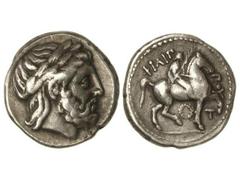 Tetradracma. 359-336 a.C. FELIPO II. MACEDONIA. Anv.: Cabeza laureada de Zeus a derecha. Rev.: Jinete a caballo a derecha, debajo láurea alrededor leyenda y símbolos. 14,10 grs. AR. Se-6683. MC+.