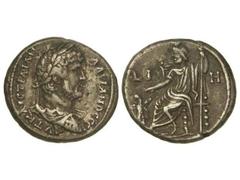 Tetradracma. ADRIANO. ALEJANDRÍA. Anv.: Busto laureado a derecha, alrededor leyenda. Rev.: Serapis entronizado a izquierda, alrededor L.I.H. 13,30 grs. Ve. GIC-1256 sim. MBC+.