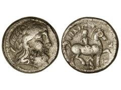 Tetradracma. 359-336 a.C. FILIPO II. AMPHIPOLIS. IMITACIÓN CELTA. Anv.: Cabeza laureada de Zeus a derecha. Rev.: Jinete con palma a derecha, alrededor leyenda y símbolos. 13,20 grs. AR. (Pequeñas rayi