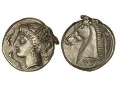 Tetradracma. 350-325 a.C. ZEUGITANIA. Anv.: Cabeza femenina a izquierda rodeada por delfines. Rev.: Cabeza de caballo a izquierda detrás palmera, debajo letrás púnicas. 16,90 grs. AR. Se-6434 var. EBC