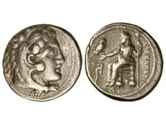 Tetradracma. 336-323 a.C. ALEJANDRO MAGNO. Anv.: Cabeza de Hércules con piel de león a derecha. Rev.: Zeus entronizado a izquierda, detrás leyenda, delante símbolo. 17,20 grs. AR. Se-6717 var. MBC+/MB