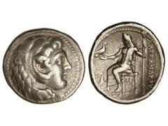 Tetradracma. 336-323 a.C. ALEJANDRO MAGNO. Anv.: Cabeza de Hércules con piel de león a derecha. Rev.: Zeus entronizado a izquierda, detrás leyenda, delante símbolo. 16,70 grs. AR. Se-6717 var. MBC+/MB