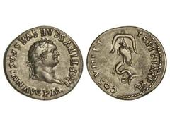 Denario. Acuñada el 80 d.C. TITO. Anv.: IMP. TITVS CAES. VESPASIAN. AVG. P. M. Cabeza laureada a derecha. Rev.: TR. P. IX IMP. XV COS. VIII P. P. Delfín enroscado en áncora. 3,30 grs. C-309. MBC/MBC+.