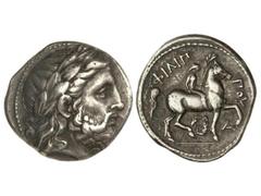 Tetradracma. 359-336 a.C. FILIPO II. MACEDONIA. Anv.: Cabeza laureada de Zeus a derecha. Rev.: Jinete desnudo a derecha, alrededor leyenda. 14,20 grs. AR. Ligera pátina. Se-6680 sim. BC-.
