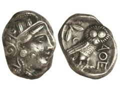 Tetradracma. 393-300 a.C. ATENAS. Anv.: Cabeza de Atenea con casco a derecha. Rev.: Lechuza en pie a derecha, delante A¶E, detrás rama de olivo y creciente. 16,90 grs. AR. Se-2537. MBC+.