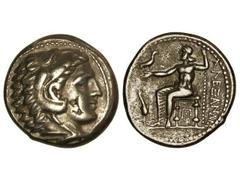 Tetradracma. 336-323 a.C. ALEJANDRO MAGNO. MACEDONIA, TRACIA, TESALIA. Anv.: Cabeza de Hércules con piel de león a derecha. Rev.: Zeus entronizado a izquierda, alrededor leyenda y símbolos. 17,10 grs.