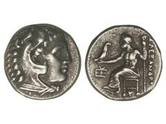 Dracma. 336-323 a.C. ALEJANDRO MAGNO. TRAELIUM. MACEDONIA. Anv.: Cabeza de Hércules con piel de león a derecha. Rev.: Zeus entronizado a izquierda, monograma delante, debajo símbolo y detrás leyenda. 
