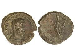 Tetradracma. 253-268 d.C. GALIENO. ALEJANDRÍA (EGIPTO). Anv.: Busto laureado a derecha, alrededor leyenda. Rev.: Tyche en pie a izquierda con cornucopia y timón. 9,30 grs. AE. Pátina marrón. BMC-2200.