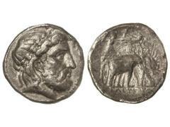 Tetradracma. 312-280 a.C. SELEUCO I. REINO SELÉUCIDA. Anv.: Cabeza laureada de Zeus a derecha. Rev.: Atenea conduciendo un carro de cuatro elefantes. 16,70 grs. AR. Se-6831. MBC+/MBC.