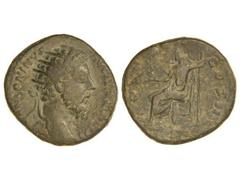 Dupondio. Acuñada el 172-173 d.C. MARCO AURELIO. Anv.: M. ANTONINVS AVG. TR. P. XXXVII. Cabeza radiada a derecha. Rev.: IMP. (VI) COS. III. S. C. Júpiter, sedente, a izquierda, portando Victoria y cet