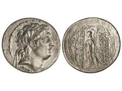 Tetradracma. 138-129 a.C. ANTÍOCO VII. REINO SELÉUCIDA. Anv.: Cabeza diademada a derecha. Rev.: Atenea en pie a izquierda con Nike, delante y detrás leyenda. 16,30 grs. AR. Se-7091. MBC+.