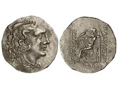 Tetradracma. 336-323 a.C. ALEJANDRO MAGNO. ODESSUS. Anv.: Cabeza de Hércules con piel de león a derecha. Rev.: Zeus entronizado a izquierda, delante y detrás leyenda. 16,10 grs. AR. Müller-429. EBC-.
