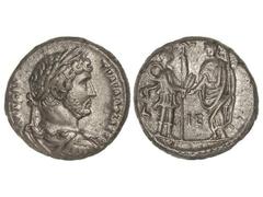 Tetradracma. Acuñada el 117-138 d.C. ADRIANO. Anv.: Busto laureado a derecha. Rev.: Adriano en pie a izquierda, recibiendo espigas de trigo de Alejandría. Ve. GIC-1257. EBC-.