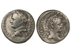 Tetradracma. Acuñada el 70-71 d.C. VESPASIANO y TITO. SIRIA. Anv.: Busto laureado de Vespasiano a izquierda, alrededor leyenda. Rev.: Busto laureado de Tito a derecha, delante B, detrás estrella, alre