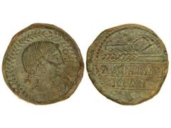 Dupondio. OBULCO. Anv.: Cabeza femenina a derecha dentro de corona. Rev.: Arado a derecha, debajo espiga y leyenda ibérica en dos líneas. 32,60 grs. (Posiblemente parte de la leyenda de reverso realza