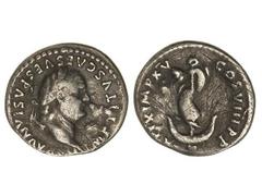 Denario. Acuñada el 80 d.C. TITO. Anv.: IMP. TITVS CAES. VESPASIAN. AVG. P. M. Cabeza laureada a derecha. Rev.: TR. P. IX IMP. XV COS. VIII P. P. Delfín enroscado en ancla. (Rayas en reverso). C-309. 