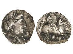 Dracma. DRACMA IBÉRICA DE IMITACIÓN EMPORITANA. ILTIRTASALIRUSTIN. Anv.: Cabeza femenina a derecha rodeada por tres delfines. Rev.: Pegaso a derecha con la cabeza modificada, debajo lobo y leyenda ibé