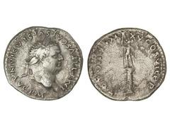 Denario. Acuñada el 79 d.C. TITO. Anv.: IMP. TITVS CAES. VESPASIAN. AVG. P. M. Cabeza laureada a derecha. Rev.: TR. P. VIIII IMP. XV COS. VII P. P. Figura radiada sobre columna rostral. 3,09 grs. C-28