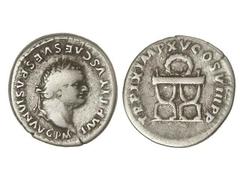 Denario. Acuñada el 79-80 d.C. TITO. Anv.: IMP. TITVS CAES. VESPASIAN. AVG. P. M. Cabeza laureada a derecha. Rev.: TR. P. IX. IMP. XV. COS. VIII. P. P. Guirnalda y silla curul. 3,33 grs. C-318. MBC-.