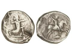 Tetradracma. 350-334 a.C. REINO AQUEMENIDA. CARIA. Anv.: Rey Persa con arco a derecha. Rev.: Sátrapa a caballo a derecha, debajo delfín. 13,53 grs. AR. (Golpe de cizalla). SNG-Kaylan 1004. MBC-.